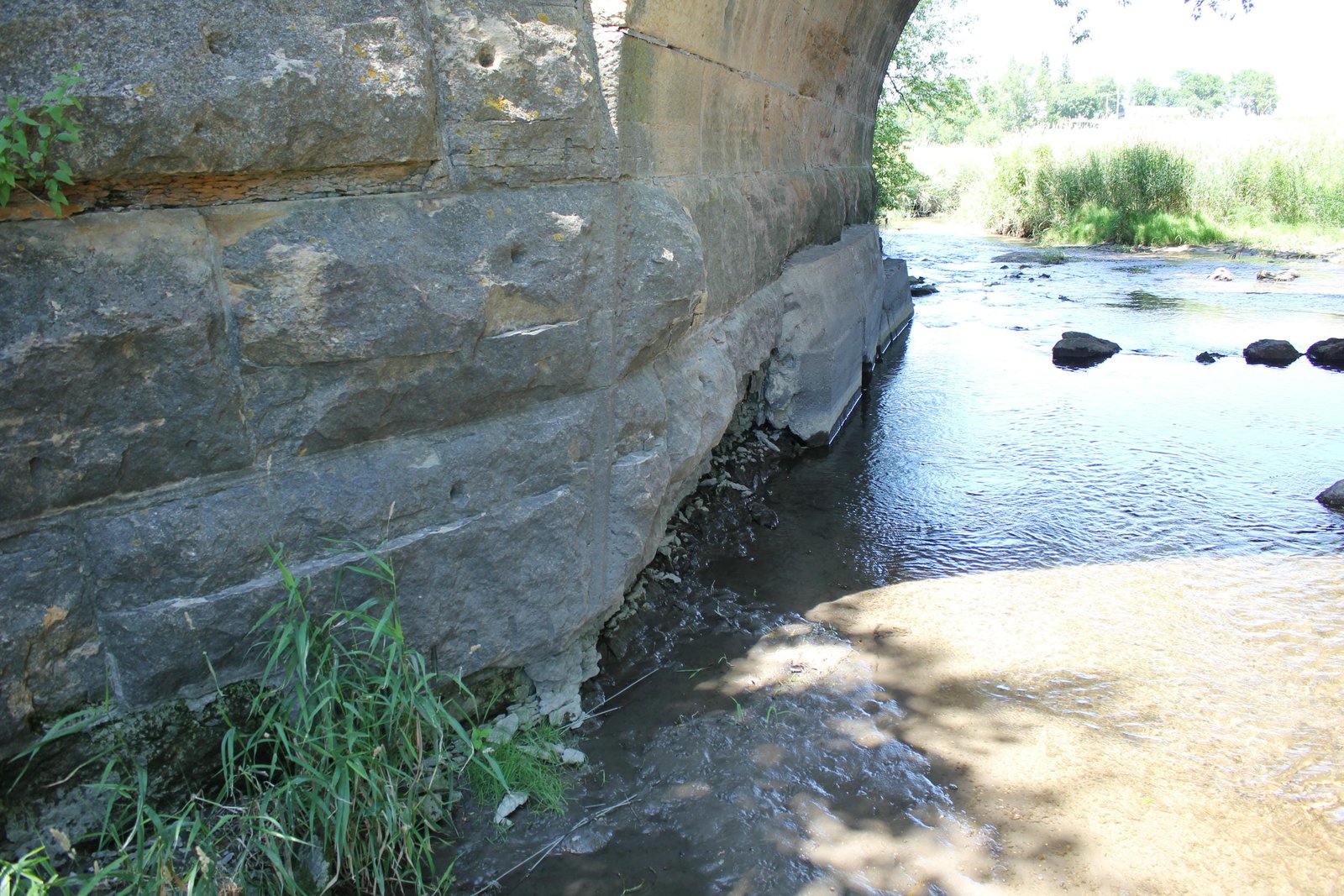 Scouring near southwest corner of bridge